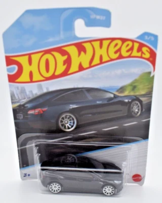 Hot Wheels 2022 Tesla Model 3 black Luxury Sedans. european long card - Image 1 of 3