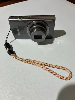 Canon PowerShot ELPH 160-FOR PARTS-LENS SCRATCHES CAUSE GLARE & LINES - Image 1 of 4