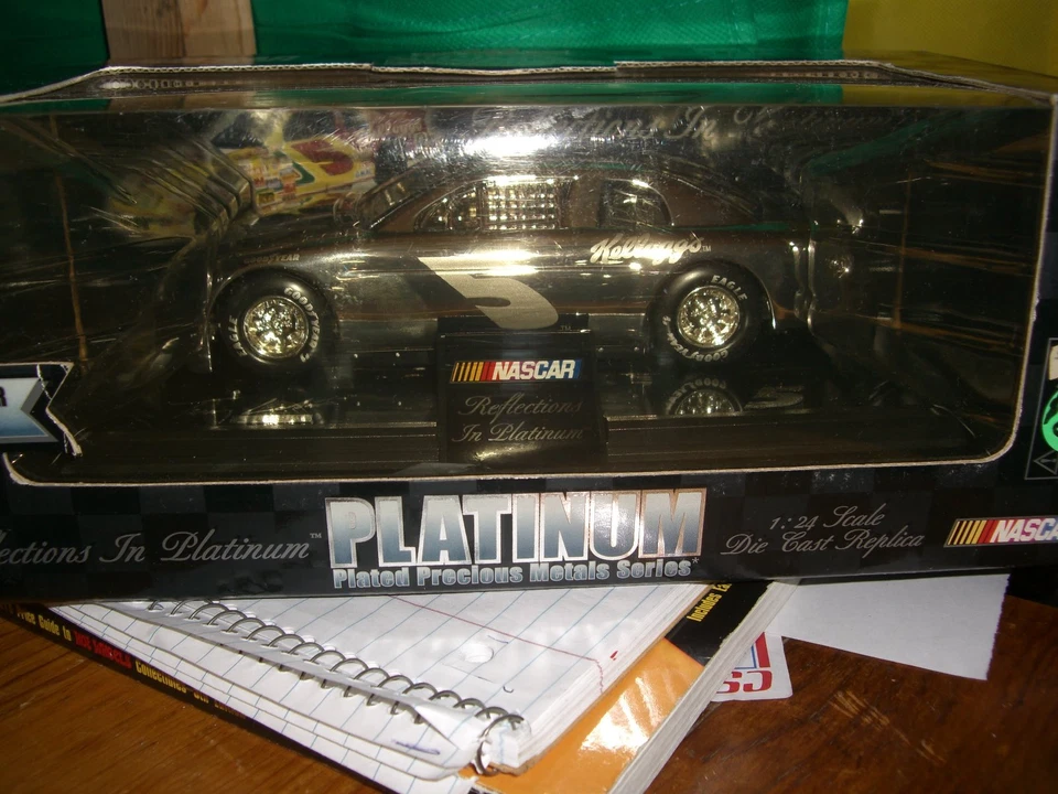 Racing Champions Reflections in Platinum Ricky Rudd 10 Ford Taurus Tide 1 24