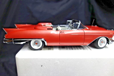 Coche fundido a presión Danbury 1957 Cadillac Eldorado Biarritz Dusty Rose escala 1:24 como nuevo Foto 1 de 4