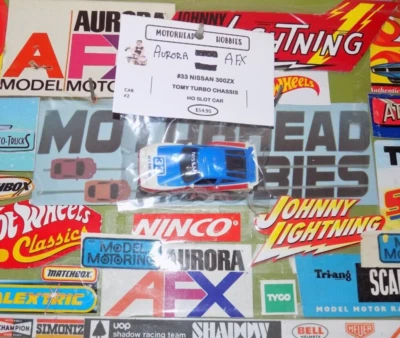 AURORA AFX, #33 NISSAN 300ZX con chasis TOMY TURBO, HO SLOT CAR, COCHE #2 Foto 1 de 4