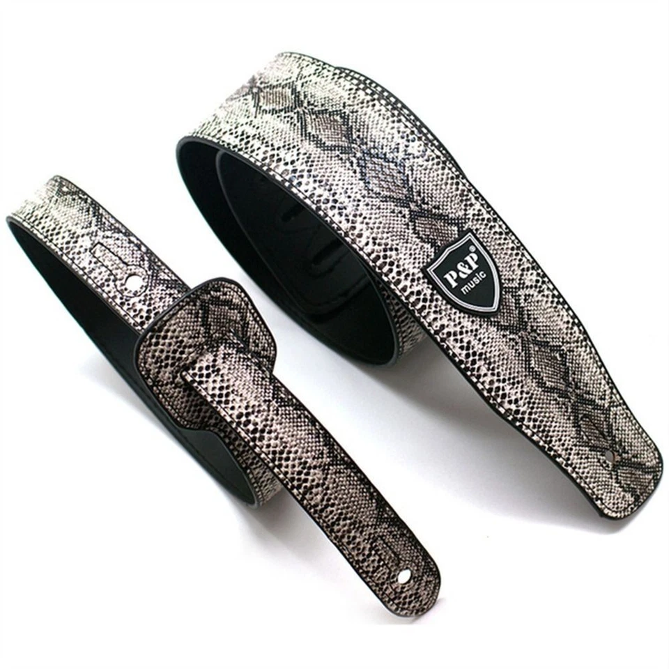 Correa de guitarra ajustable de cuero PU en relieve para correa de bajo eléctrico acústico Foto 1 de 4