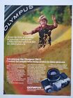 Olympus OM-G Camera Child Running Golden Wheat Field 1983 Vintage Print Ad