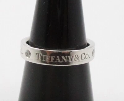0.12 ctw Diamond Tiffany & Co Platinum Band Ring 4MM Size 6 - Image 1 of 4