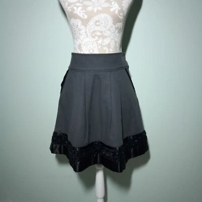 Minifalda plisada Marc Jacobs talla 6, gris negra satinada cuentas línea A bolsillo de fiesta Foto 1 de 4