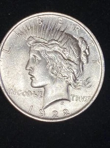 1922 UNC PEACE DOLLAR ERROR- EXTRA MEDAL ON FACE OF COIN - Picture 1 of 7