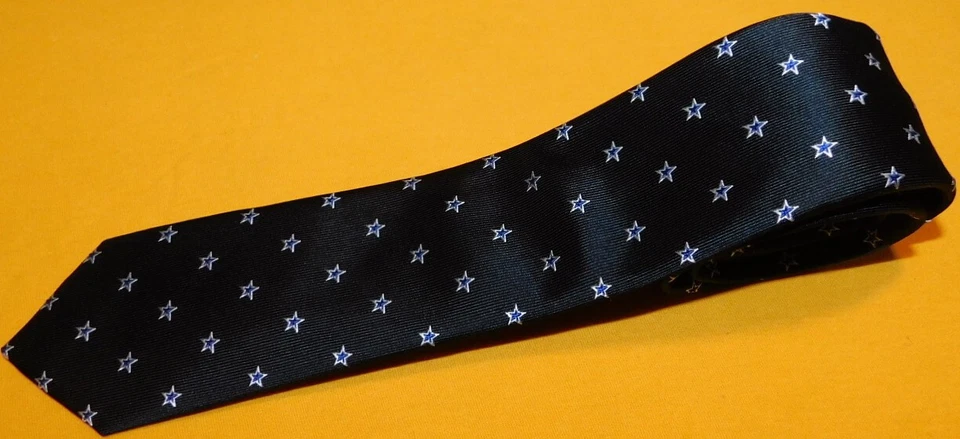 JOHN VARVATOS BLACK/WHITE/BLUE STAR MOTIF SLIM TIE - TIES - DESIGNER TIES. - Image 1 of 3