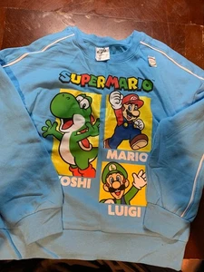 Felpa Nintendo Super Mario blu manica lunga Mario Luigi Yoshi bambini M 7-8 - Foto 1 di 3
