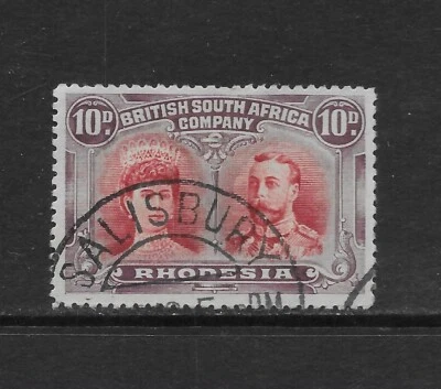 RHODESIA SCOTT 110 USADO F/VF - 1910 EDICIÓN 10p ciruela y rosa roja - mary & george v Foto 1 de 2