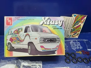 AMT Chevy Custom Van Xtasy Kit Modellismo Scala 1/25 T401 Scatola Nuovo/aperta - Foto 1 di 3