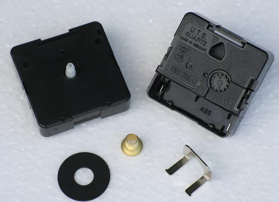 Quartz Clock Movement UTS with push fit hand shaft. - Image 1 of 1