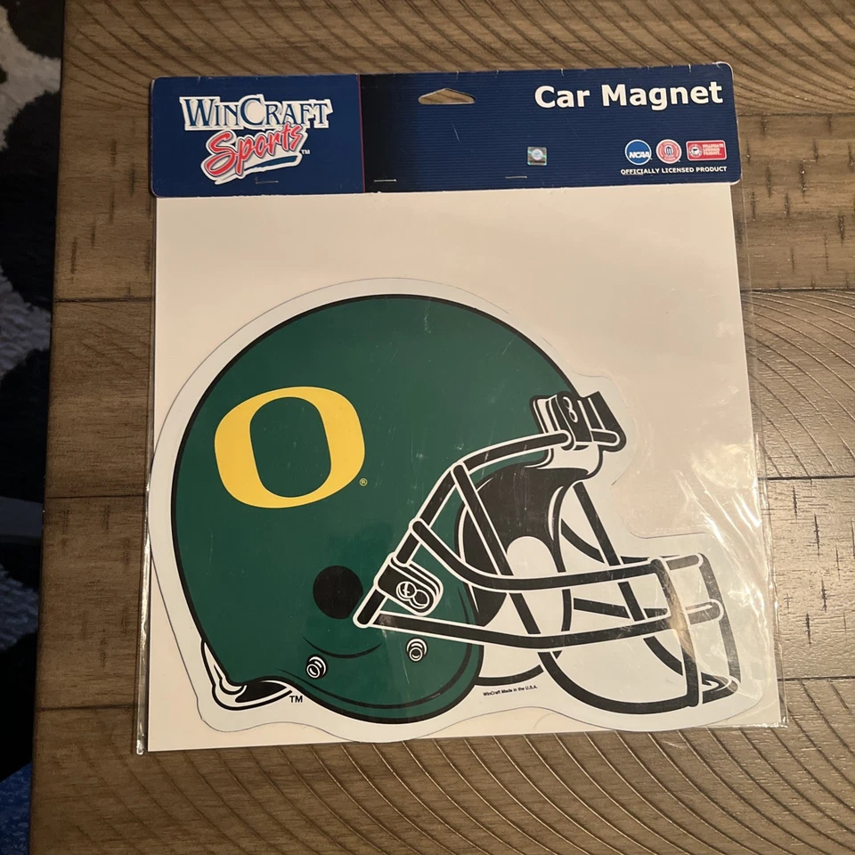 NIP OREGON DUCKS HELMET CAR MAGNET 12” - Image 1 of 1