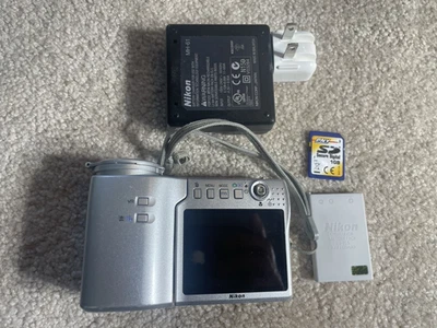 Nikon Coolpix S10 VR Digital Camera Silver + Accessories - Image 1 of 4