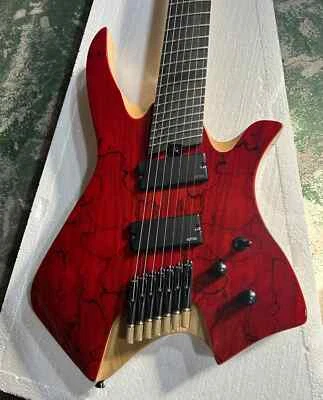 Guitarra eléctrica de 7 cuerdas con trastes abanicados sin cabeza verde y rojo de alta calidad dividida  Foto 1 de 4