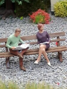  Scale3D 00/1.76 figures  handpainted male & female sitting on a bench reading 
