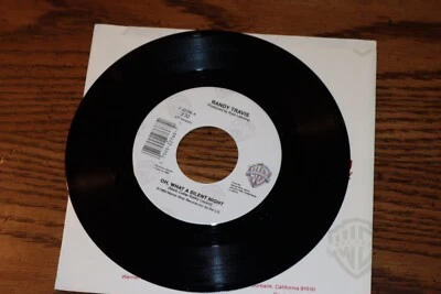 NEW VINYL CHRISTMAS 45 RANDY TRAVIS OH WHAT A SILENT NIGHT UNPLAYED - Image 1 of 2