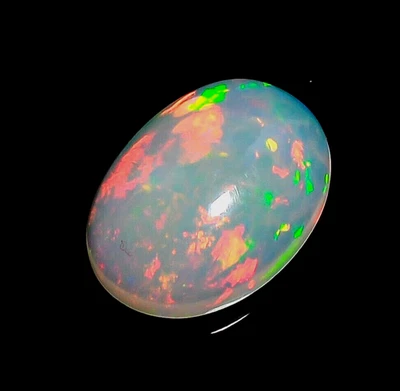 White Ethiopian Opal Oval Shape Dazzling Fire Opal Gemstone 2.1 Ct 12X9X4 mm - Image 1 of 3