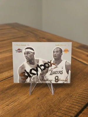 2003-04 Skybox Autographics - Rookies Affirmed LeBron James (RC), Kobe Bryant  - Image 1 of 3