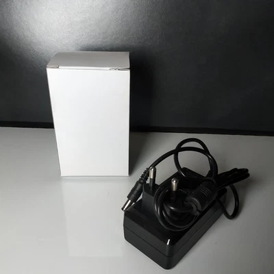 NEU Universal Netzteil Ladekabel für viele Elektrogeräte AC/DC Adapter 14V 1.5A - Bild 1 von 4