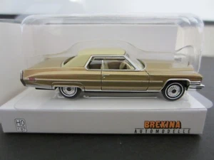 BREKINA 18126 CADILLAC CUPÉ deVILLE GOLD - el modelo es PLÁSTICO - HO / escala 1:87 - Imagen 1 de 2