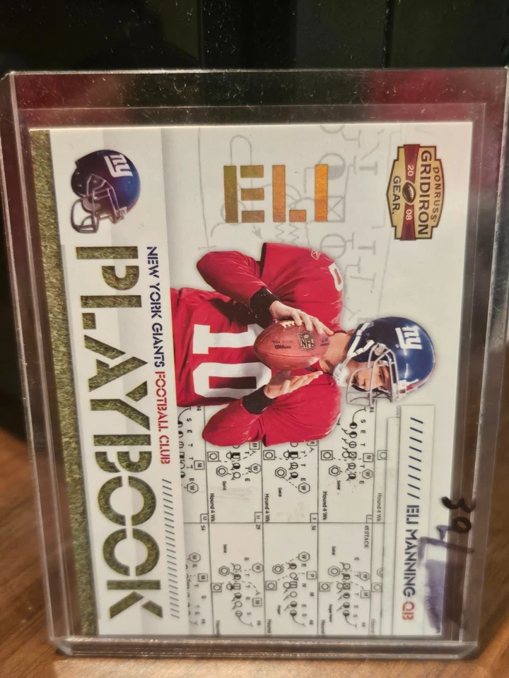 2008 Donruss Gridiron Gear Playbook Gold Eli Manning Insert Card #PL9 /100 - Image 1 of 2
