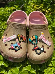 CROCS Gold Pink EUC Shoes Princess Buttons Childs Size 12 - Picture 1 of 8