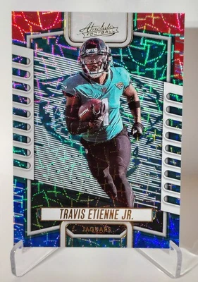 2023 Panini Absolute Football #56 Travis Etienne Red & Blue Kaleidoscope SP /499 - Image 1 of 2