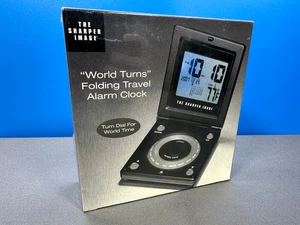 THE SHAPER IMAGE WORLD TURNS FOLDING TRAVEL ALARM CLOCK BACKLIT SCREEN NEW - Picture 1 of 4