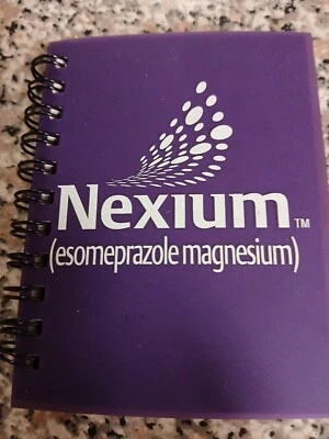 NEXIUM Wire-Ring Notebook Advertising Purple 4" x 3.5" Pgs w/ Frnt-Cov Design - Image 1 of 4