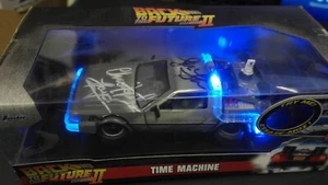 AUTOGRAPHED, TIME MACHINE W/LIGHTS BACK TO THE FUTURE 2 1/24 JADA +COA - Picture 1 of 8