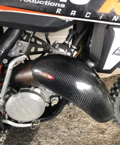 PARAESPANSIONE IN CARBONIO TEAM CIARLO KTM HUSQVARNA 125 X JOLLYMOTO-SCALVINI - Picture 1 of 1