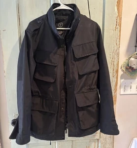 Tumi Tech Men’s Medium Black Jacket Full Zip Pockets Packable Hood - Picture 1 of 7