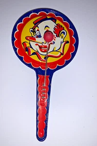 Ruido de metal vintage con cara de payaso con bolas de madera en puntas de metal - Imagen 1 de 7