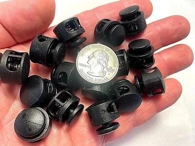 Tapón de bloqueo de cable redondo de plástico negro con cordón de resorte Paracord 2 orificios CL2 Foto 1 de 4