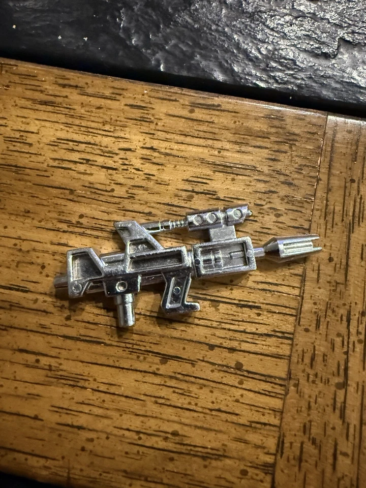 Accesorio de rifle de haz de partículas Topspin Jumpstartera G1 Transformers 1985 de colección Foto 1 de 1