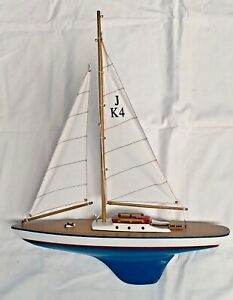 Wooden Model of a Traditional Single Masted Sailing Yacht with Display Cradle.