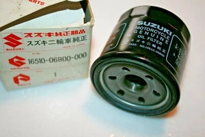 NEW Suzuki motorcycle oil filter OEM part #16510-06B00 - Bild 1 von 1