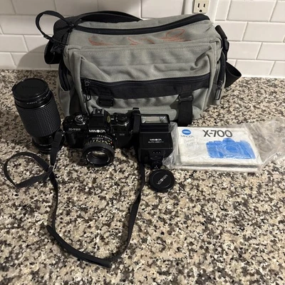 Minolta New X-700 Black Film Camera Body MD 50mm f/1.7 Lens, Flash, Bag - Image 1 of 4