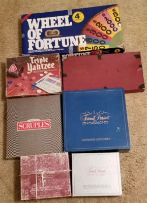 Lot 7 FAMILY GAMES W 3 TRIVIAL PURSUIT WHEEL O FORTUNE SCRUPLES SCRABBLE YATZEE  - Image 1 of 4