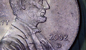 2002 D-rd- Lincoln Penny-unc. cut in face - Picture 1 of 2