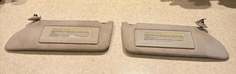 Par de parasoles laterales para conductor y pasajero Cadillac Seville 1992-1997 tela tostada Foto 1 de 4