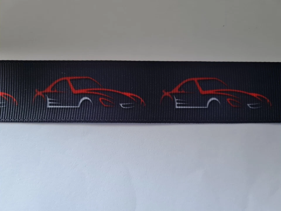 2 meters of black and red sports car print grosgrain ribbon 1" wide - Image 1 of 1
