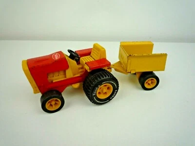 MINI TRATOR TONKA VINTAGE DE AÇO PRENSADO DA DÉCADA DE 1970 COM REBOQUE - Imagem 1 de 4