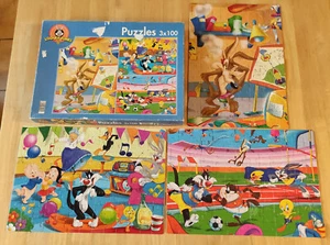 Puzzle '' LOONEY TUNES '' (3 x 100 pièces) - Photo 1/10