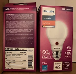 Philips Dusk To Dawn Sensor LED A19 bulb E26 Soft White 2700K 800 lumens CRI 90 - Picture 1 of 3