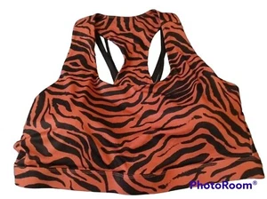 Schwarz und braun Zebramuster Fabletics Kessler Medium Sport BH 3X - Bild 1 von 3