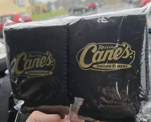 NEW Raising Cane's Chicken Drink Coozies Can Holders Black And Gold - Pack Of 10 - Picture 1 of 6