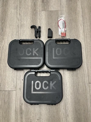 Glock OEM Pistol Case Lot Of 3 & Backstrap, Speed Loader 10.5"x9"x2.5" - Image 1 of 4