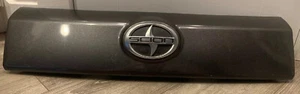 2008 09 10 11 12 2013 SCION XD TAILGATE MOLDING GARNISH LIFTGATE LATCH GRAY - Picture 1 of 11