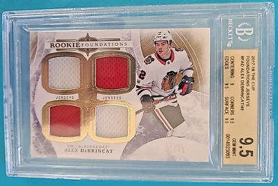 2017-18 Alex DeBrincat The Cup Rookie Foundations RC Jersey Patch /49 BGS 9.5 - Image 1 of 3